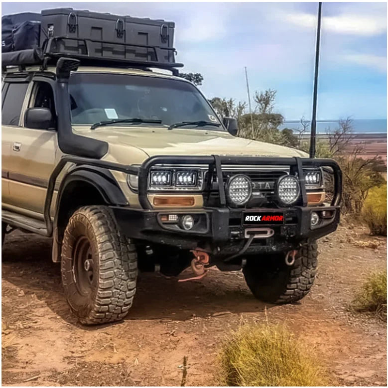 Off-road Toyota Land Cruiser with Rockarmor Brush Bars and Rockslider enhancement