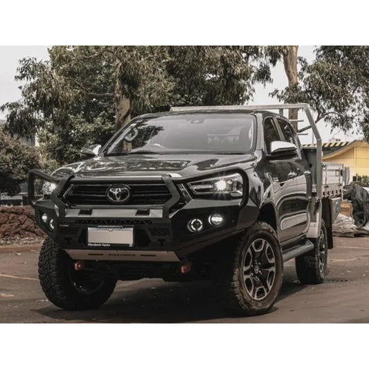 Black Toyota Hilux pickup truck with Rockarmor GT Steel Hoop Bullbar and driving lights