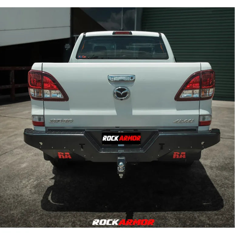 White Mazda pickup truck with aftermarket rear step tow bar for Mazda BT50 2011-2020
