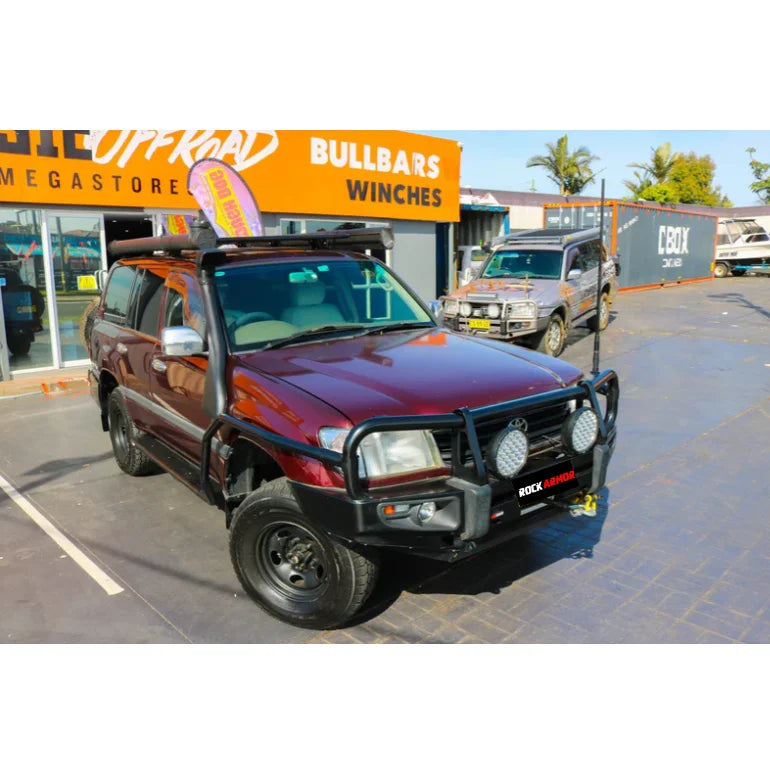Maroon SUV with black Rockarmor Brush Bars and bull bar on Toyota Landcruiser