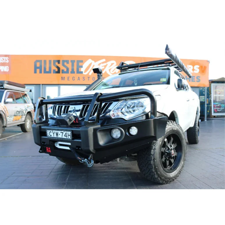 White off-road truck with black elite steel bullbar for Mitsubishi Triton MQ