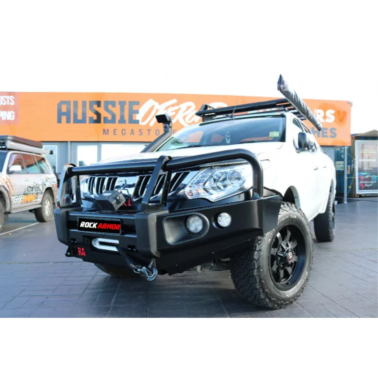 White off-road pickup truck with Rockarmor Elite Steel Bullbar and fog lights