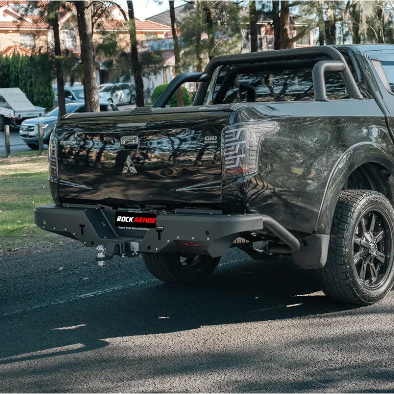 Black pickup truck with aftermarket bumper featuring rear step tow bar for Mitsubishi Triton MQ