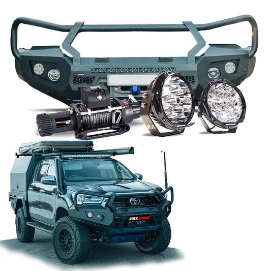 Off-road vehicle accessories featuring a steel hoop bull bar and driving lights for Toyota Hilux 2020+