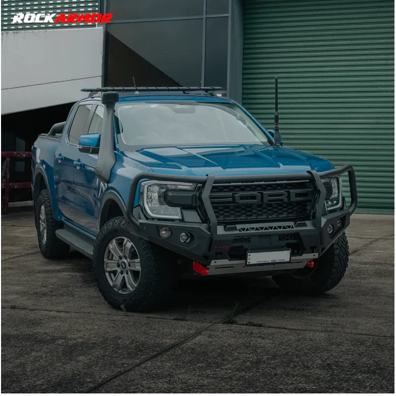 Blue Ford Ranger pickup truck with Rockarmor GT Bull aftermarket bull bar and driving lights