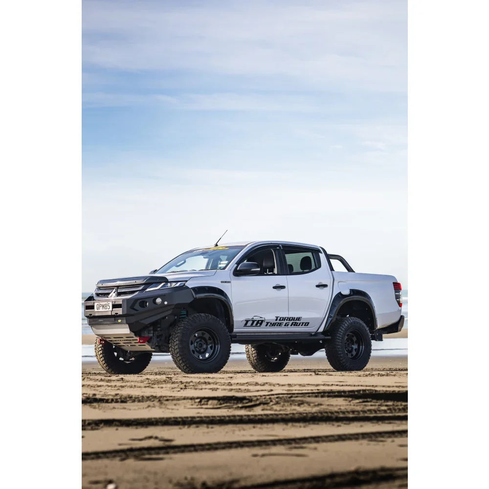 White off-road pickup truck with Rockarmor GT Steel Bull Bar and driving lights
