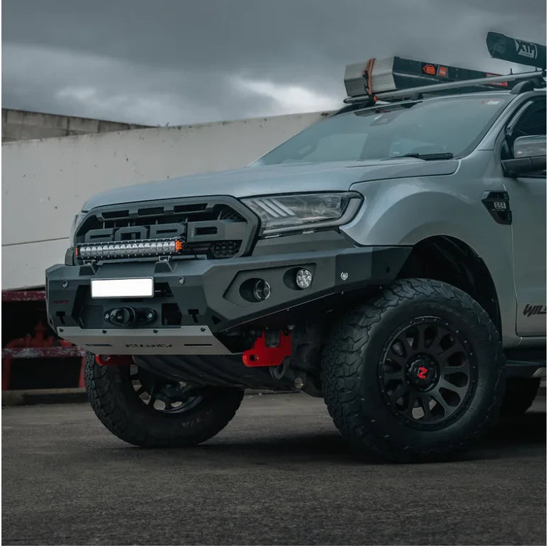 Modified silver Ford Ranger with Rockarmor Gt Steel Hoopless Bullbar showcasing rated recovery points