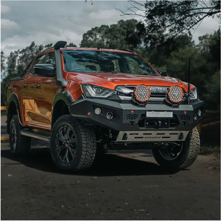 Orange off-road pickup truck with Rockarmor GT Bull steel bull bar and driving lights