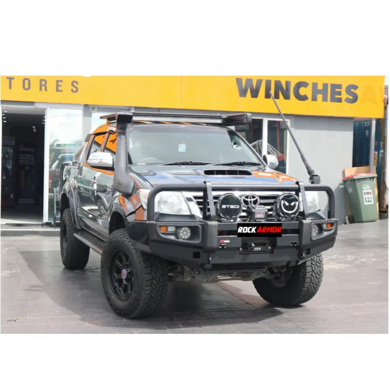 Modified black pickup truck with Rockarmor premium steel bullbar for Toyota Hilux N70