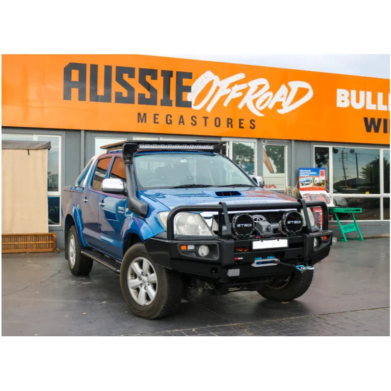 Blue off-road pickup truck with Rockarmor premium steel bullbar for Toyota Hilux N70