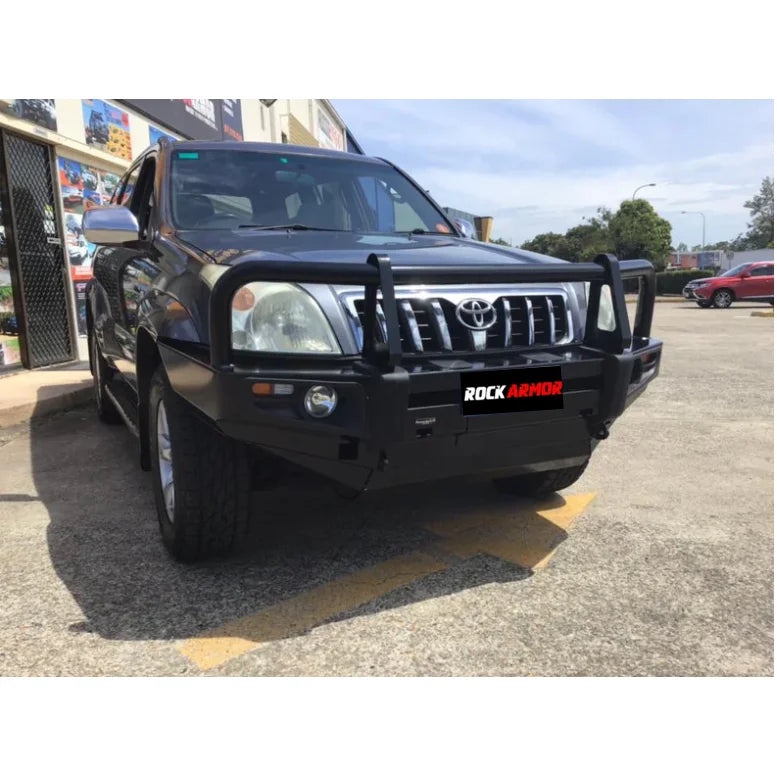 Black Toyota Prado with premium steel bull bar and fog lights for off-road protection