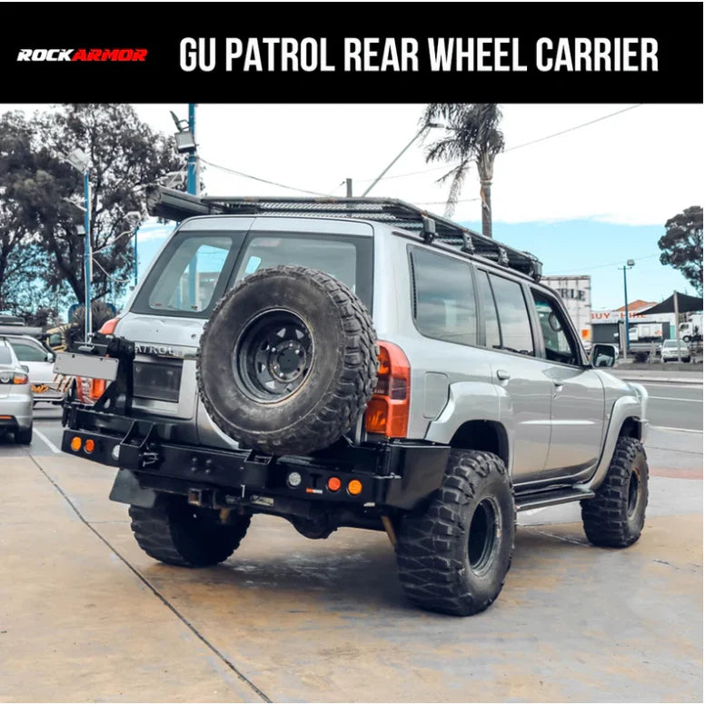 Silver SUV with rear wheel carrier for Nissan Patrol Y61 spare wheel fitting video
