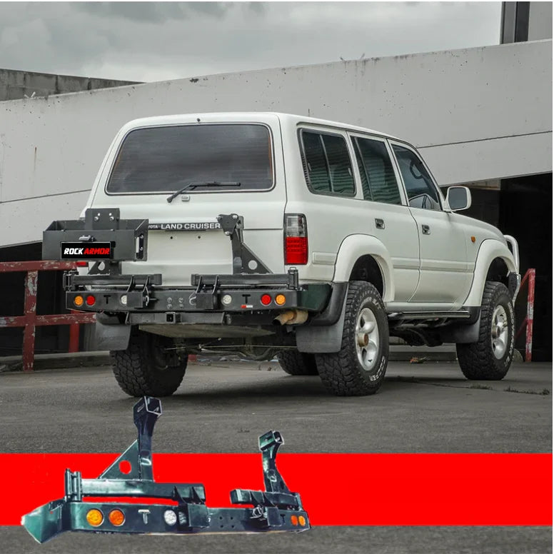 White Land Cruiser with aftermarket rear bumper and steel dual wheel carrier for spare wheel