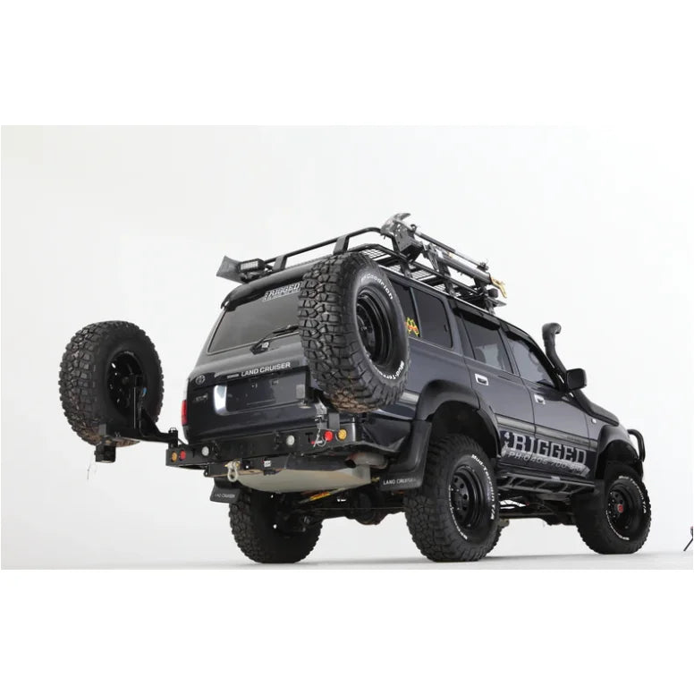 Black off-road vehicle with roof rack and spare wheel showcasing Rockarmor Steel Dual Wheel Carrier fitting video