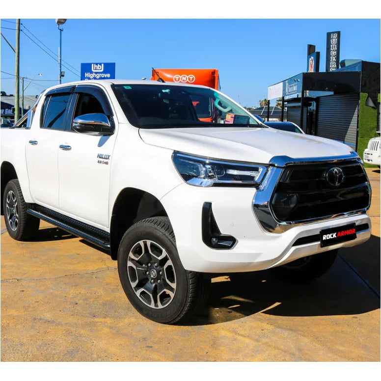 White Toyota Hilux pickup truck with Steel Checker Plate Rockarmor side steps and fitting video