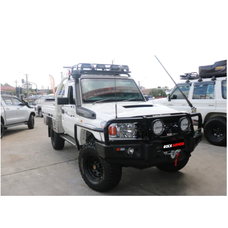 White off-road pickup truck with steel checker plate Rockarmor side steps for Toyota Landcruiser