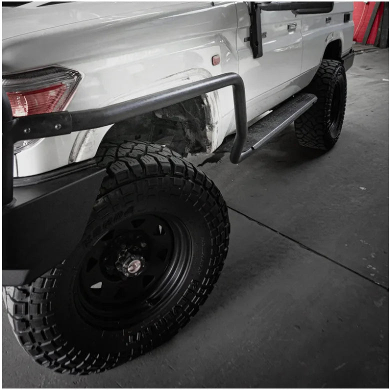 White off-road vehicle with steel checker plate Rockslider side steps for Toyota Landcruiser